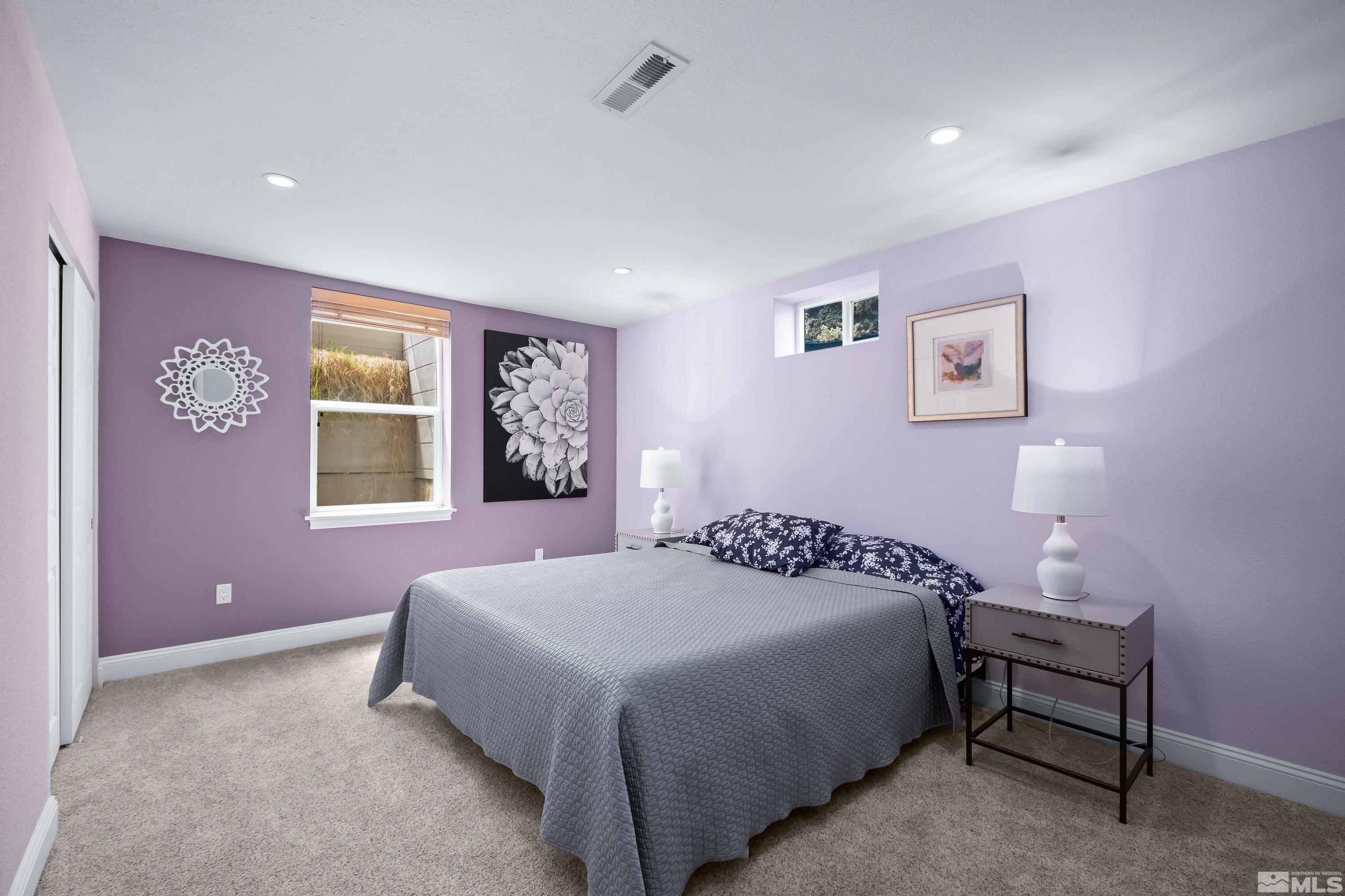 330 Chevy Chase Street Reno, NV 89509 - Photo 21 of 40 a bedroom with a bed and a painting on the wall