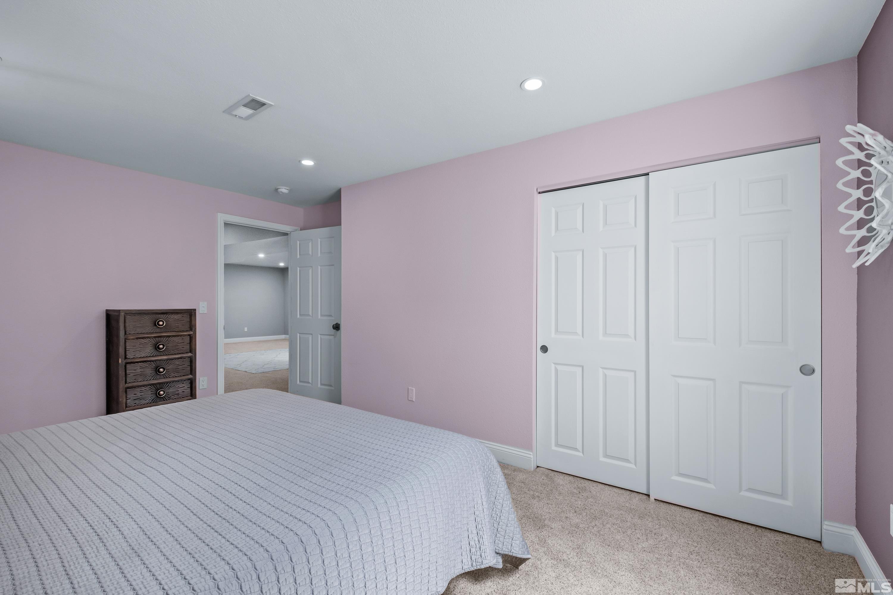 330 Chevy Chase Street Reno, NV 89509 - Photo 22 of 40 a bedroom with a bed and a closet
