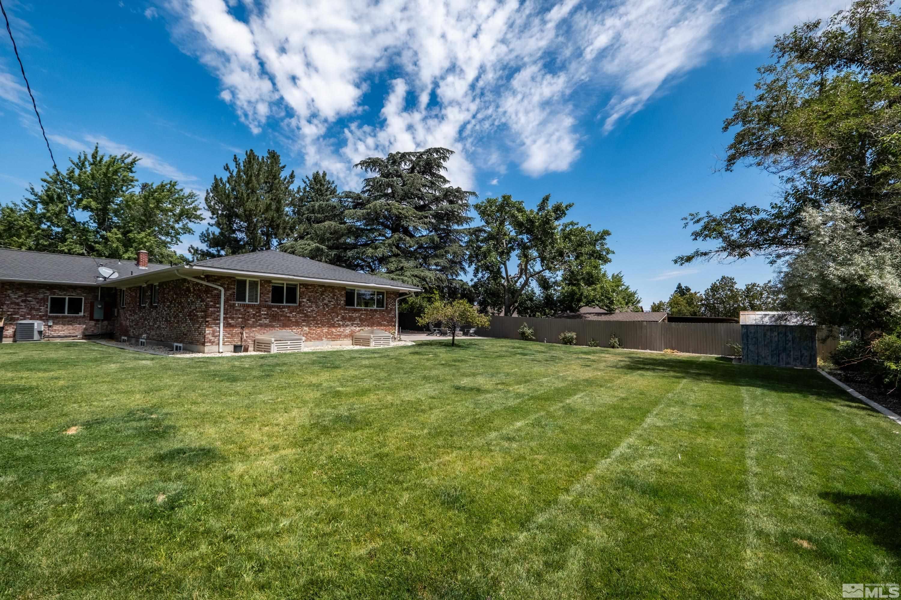 330 Chevy Chase Street Reno, NV 89509 - Photo 34 of 40 a view of a house with a yard