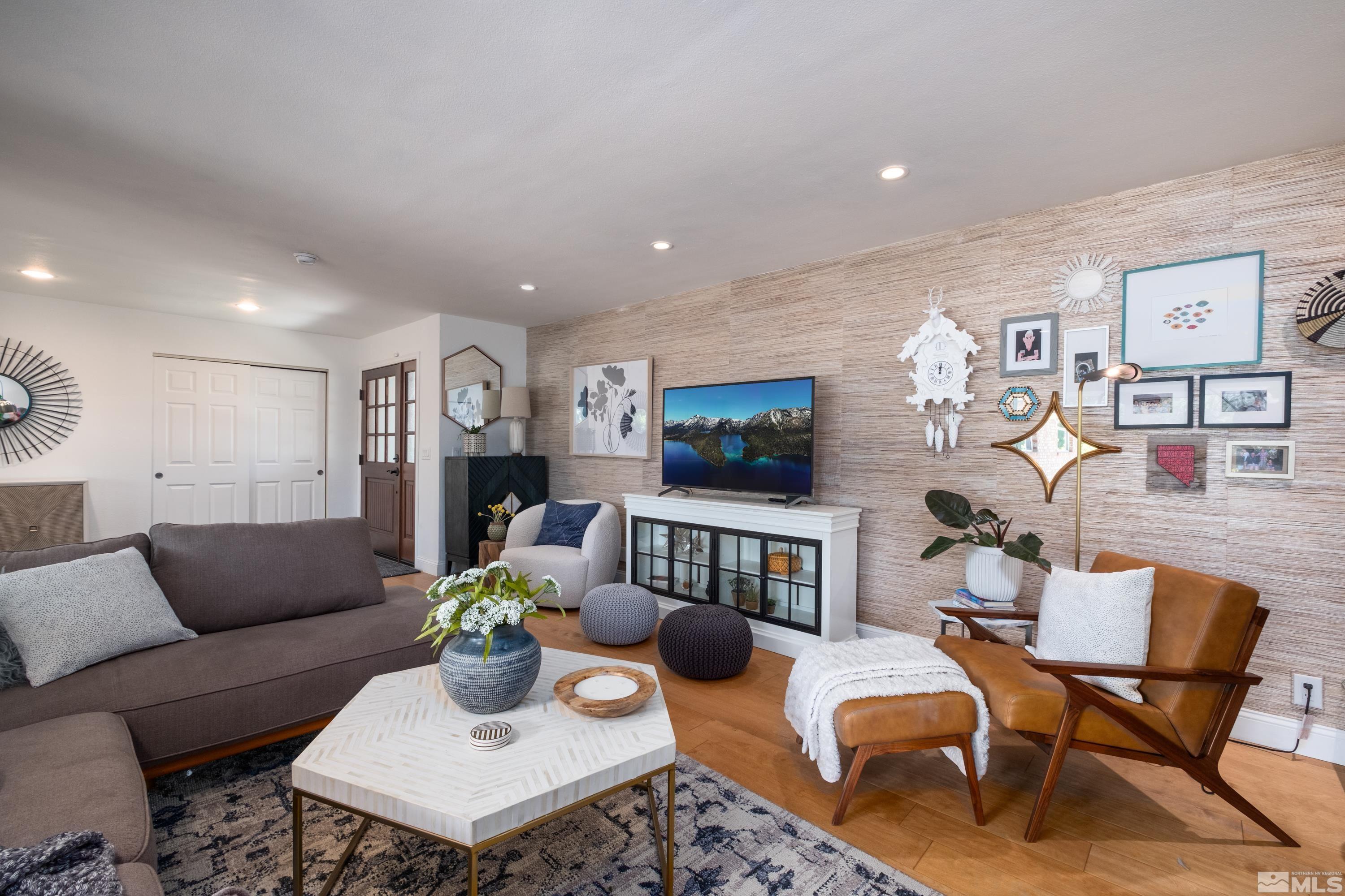 330 Chevy Chase Street Reno, NV 89509 - Photo 5 of 40 a living room with furniture a flat screen tv and a wall