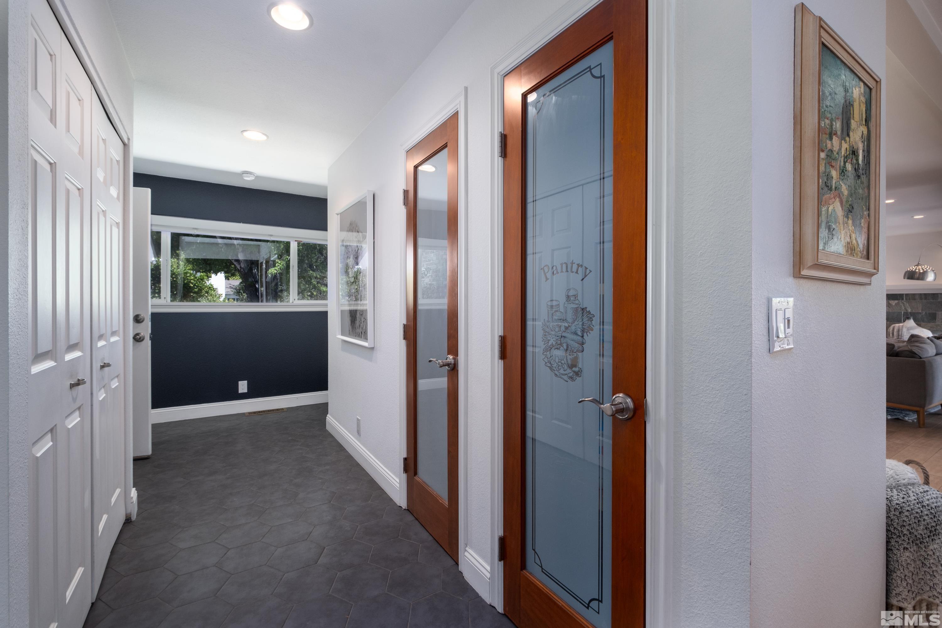 330 Chevy Chase Street Reno, NV 89509 - Photo 10 of 40 a view of a hallway with wooden floor and windows