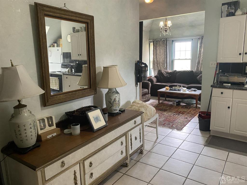 531 West 8th Street, Unit D Plainfield, NJ 07060 - Photo 2 of 10 a kitchen with a sink and a stove top oven