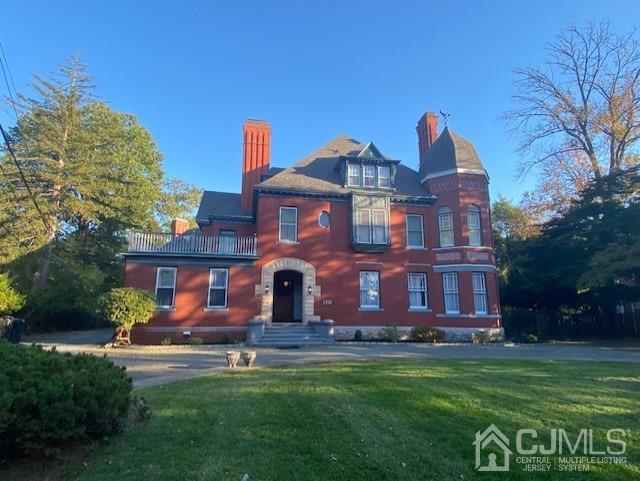 531 West 8th Street, Unit D Plainfield, NJ 07060 - Photo 10 of 10 a front view of a house with a garden