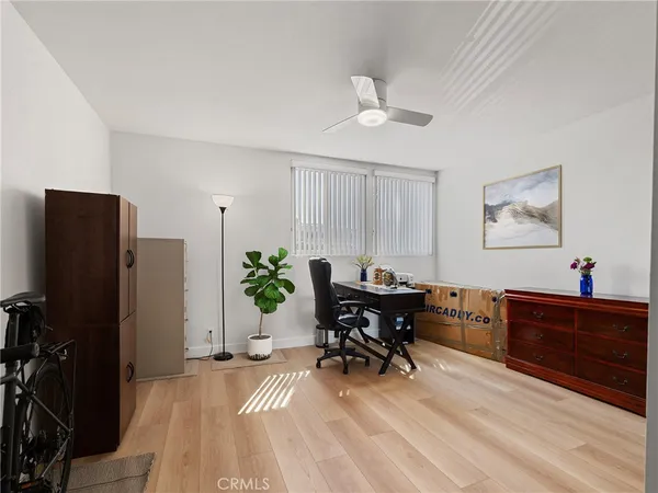 a view of a workspace with furniture