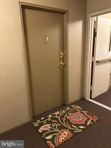 a view of a livingroom with wooden floor