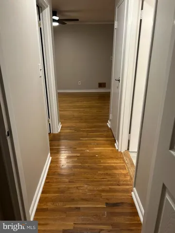 a view of wooden floor and stairs