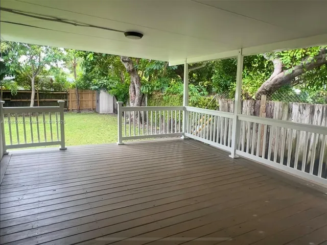 a view of deck with flat screen tv