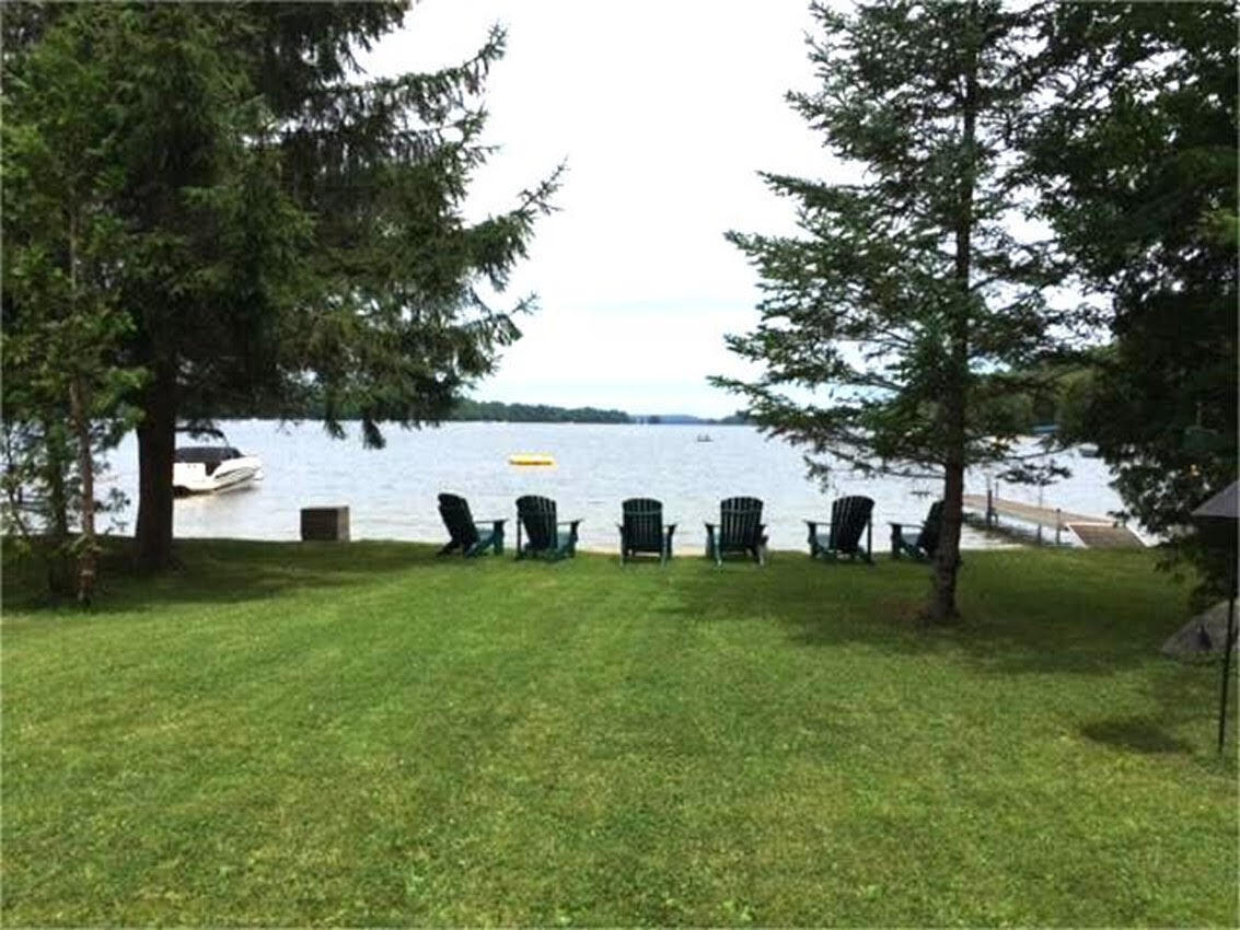 160 Pinkhams Cove Road Belgrade, ME 04917 - Photo 3 of 38 Level lot right to the water!