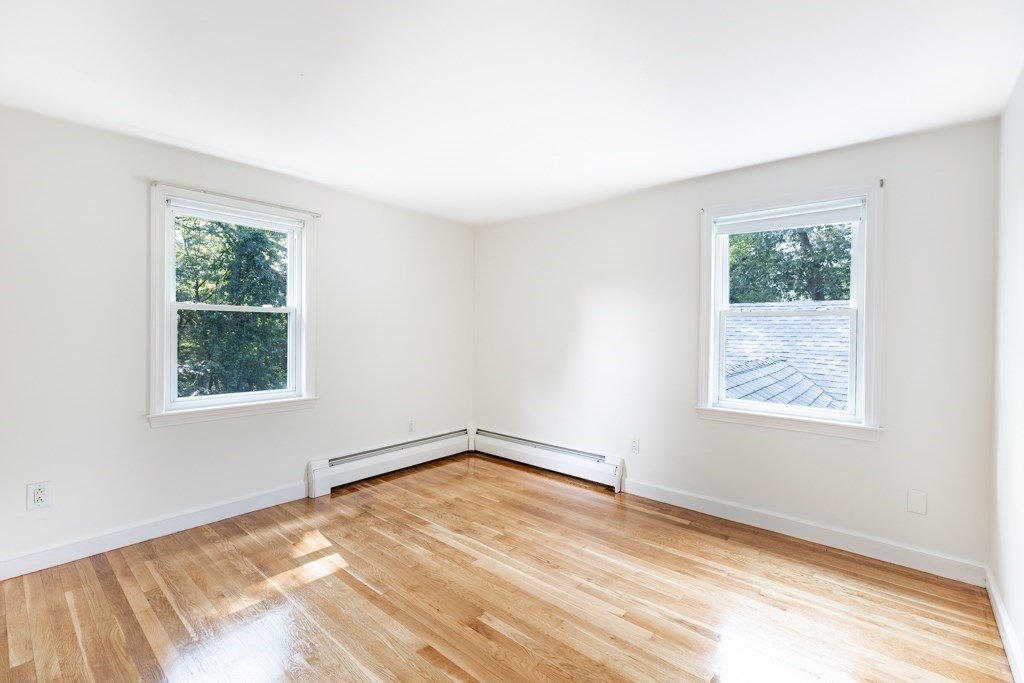 8 Michael Road Wakefield, MA 01880 - Photo 17 of 35 an empty room with a window