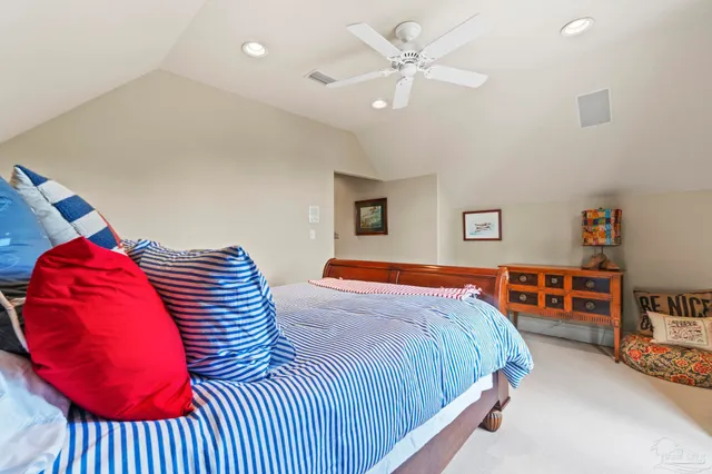 a living room with furniture a table and a flat screen tv