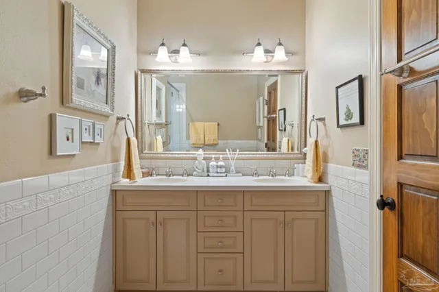 a view of a chairs and table in patio