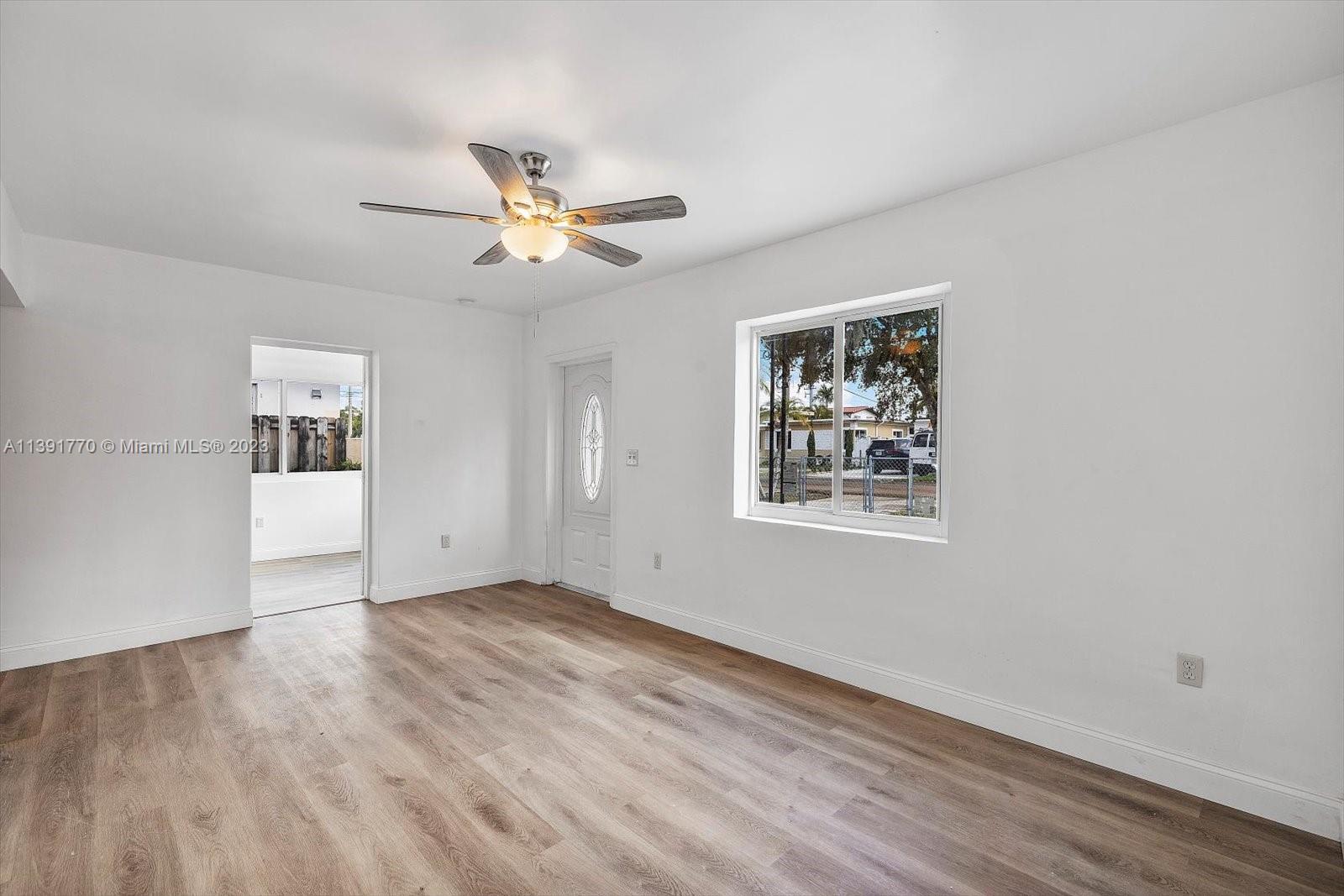 6110 Southwest 20th Street Miami, FL 33155 - Photo 6 of 29 a view of an empty room with a window