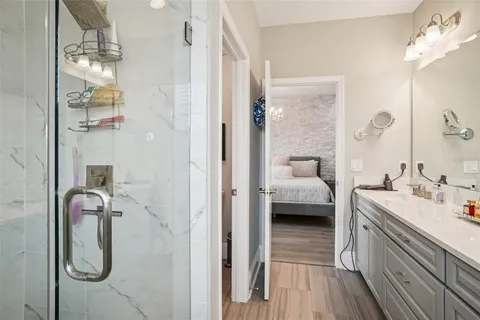 a bedroom with bed and window