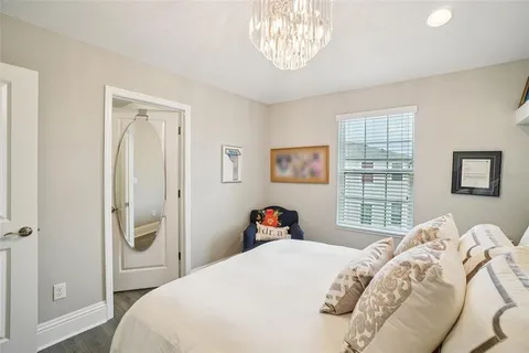 a bathroom with a sink a toilet and shower curtain