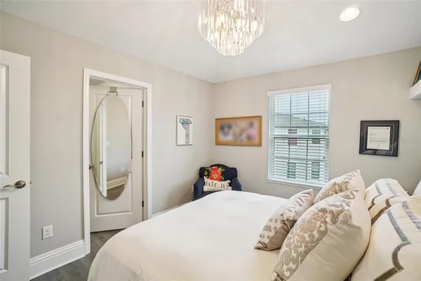a bathroom with a sink a toilet and shower curtain