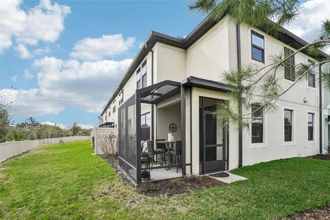 a view of pool with outdoor seating