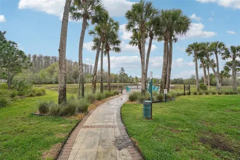 a view of a lake with a garden