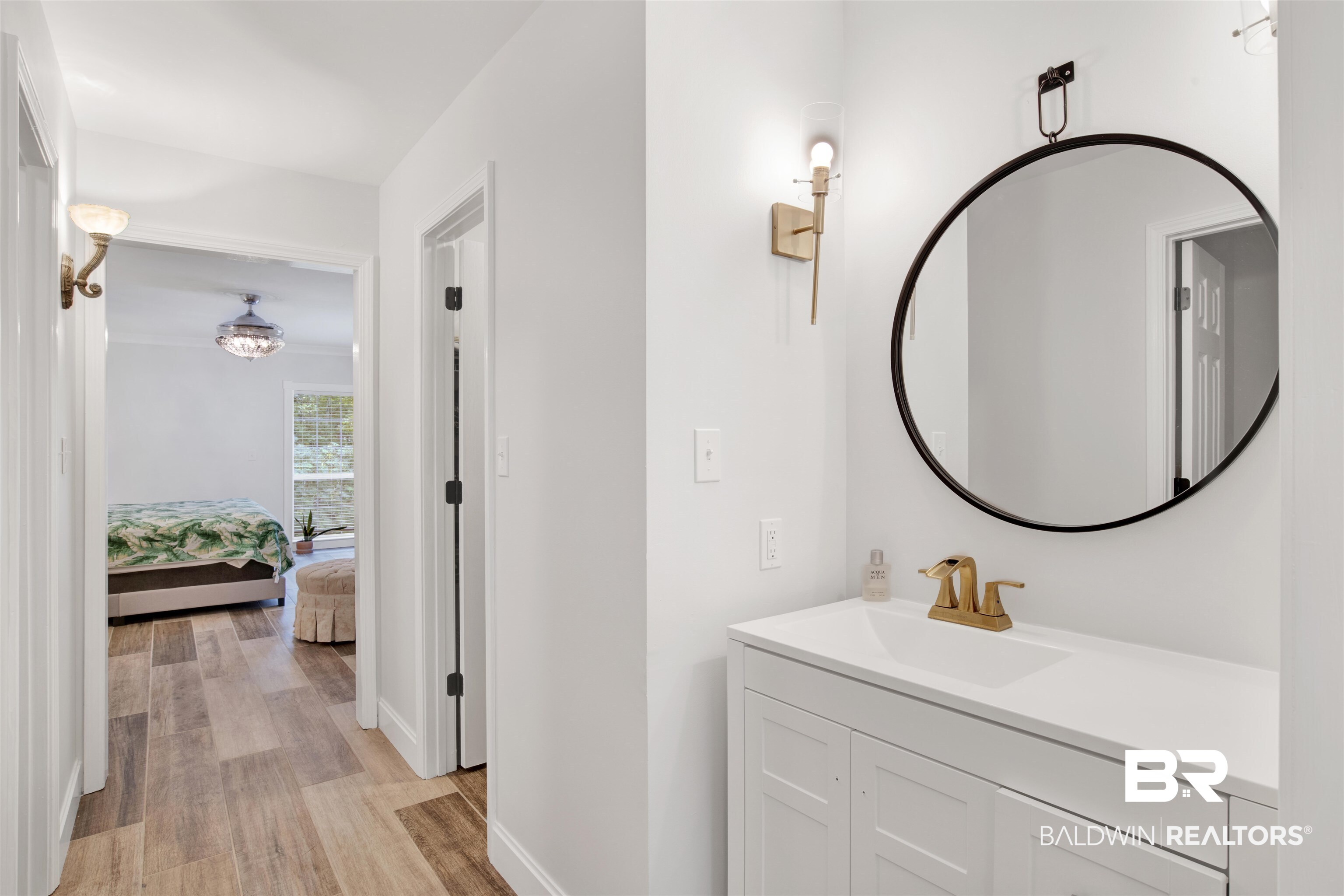 7641 Hitt Road Mobile, AL 36695 - Photo 17 of 29 Bathroom featuring vanity and hardwood / wood-style floors