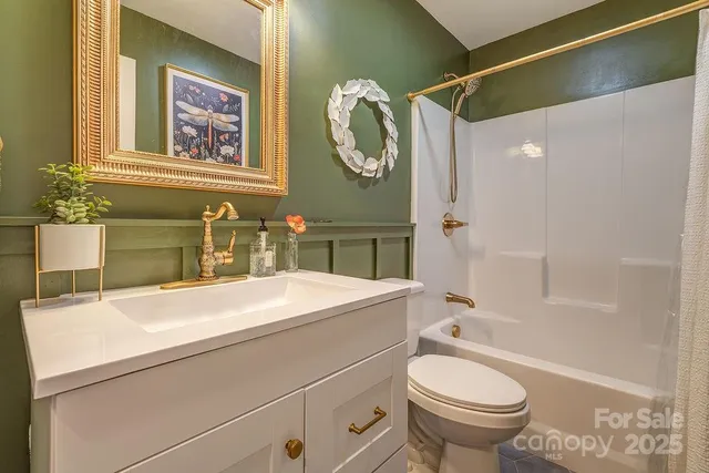 a bathroom with a sink a toilet and a bathtub