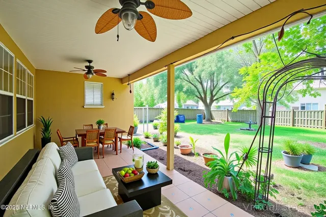 a view of a patio with couches table and chairs