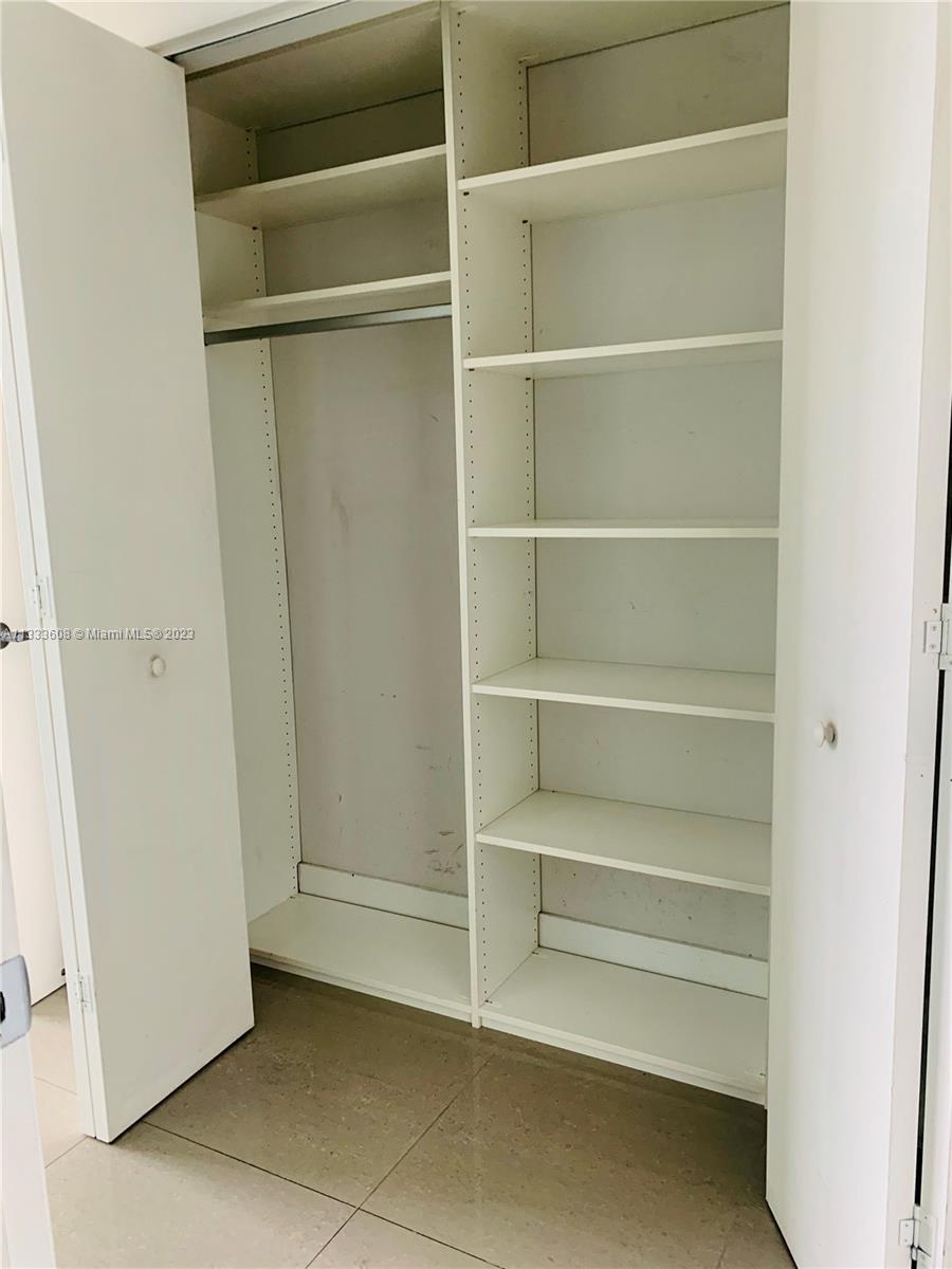 92 Southwest 3rd Street, Unit 4111 Miami, FL 33130 - Photo 14 of 24 a view of an empty walk in closet