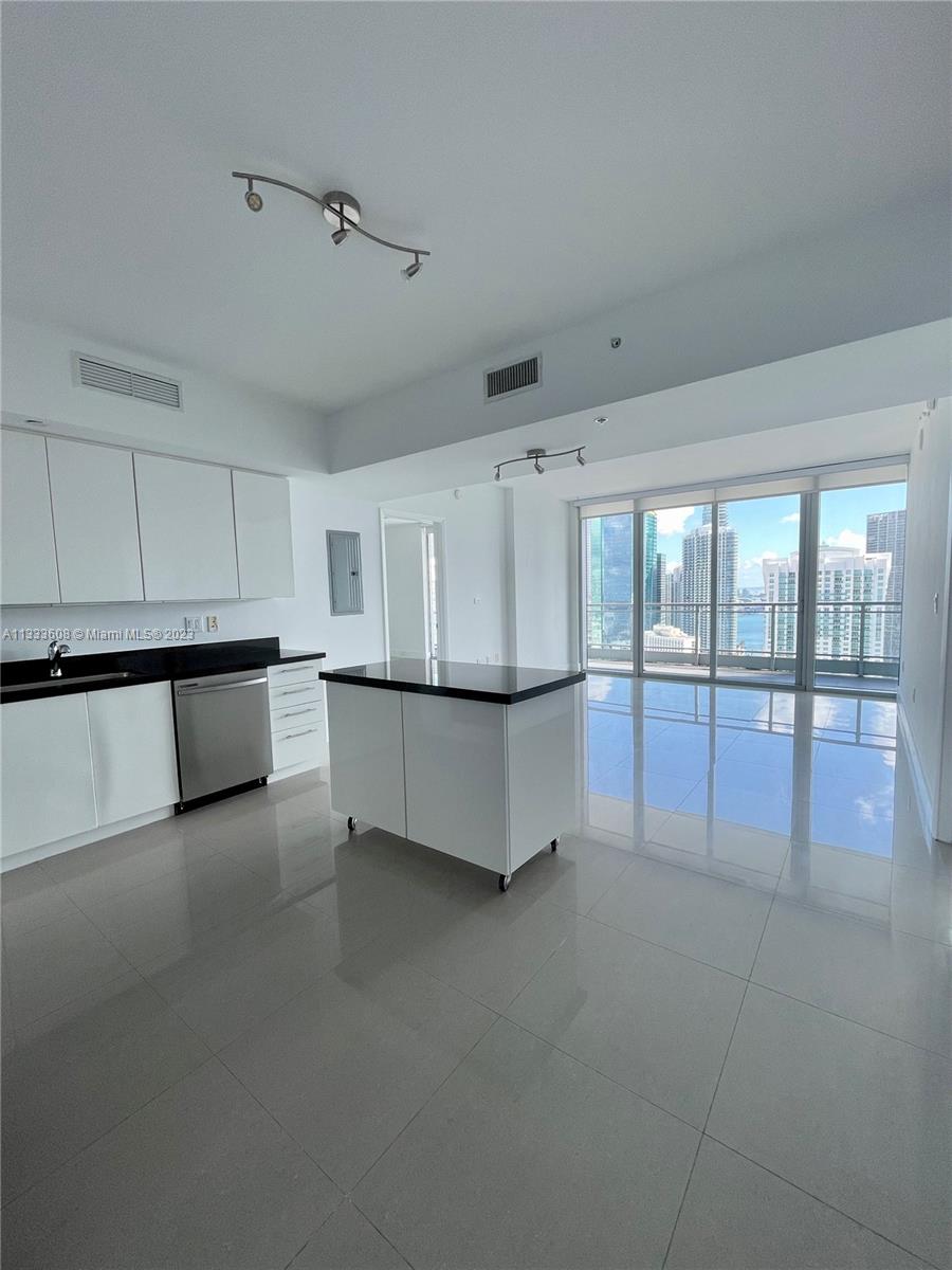 92 Southwest 3rd Street, Unit 4111 Miami, FL 33130 - Photo 3 of 24 a view of an empty room with a window