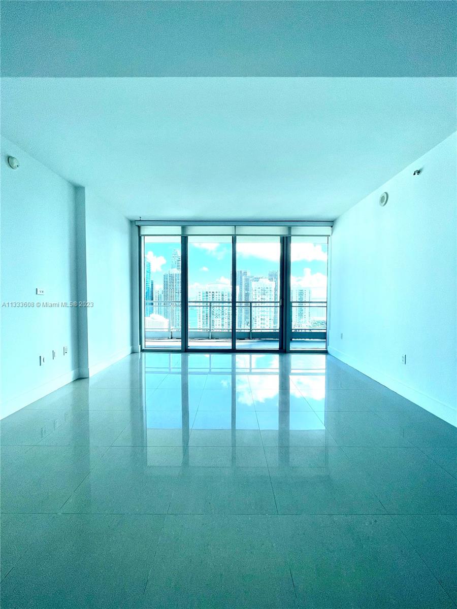 92 Southwest 3rd Street, Unit 4111 Miami, FL 33130 - Photo 5 of 24 a view of an empty room with window