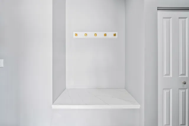 a close up of a white wall