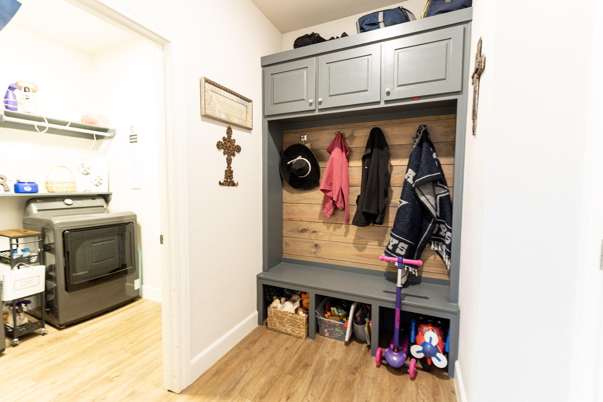 6801 51st Street Lubbock, TX 79407 - Photo 15 of 19 a view of walk in closet with clothes and shoes