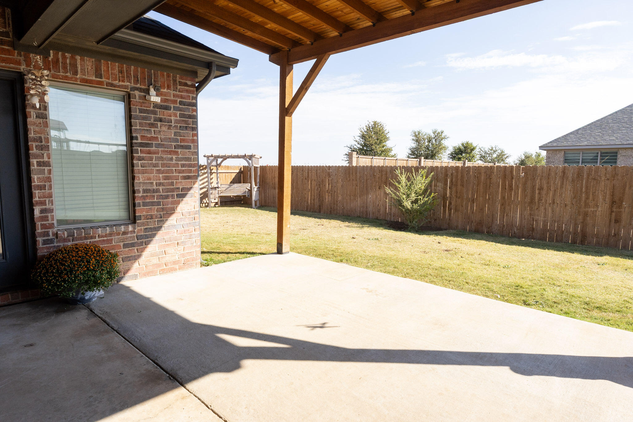 6801 51st Street Lubbock, TX 79407 - Photo 17 of 19 a view of a backyard of the house