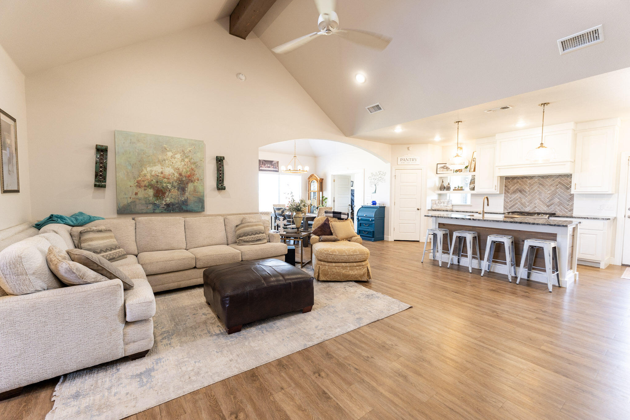 6801 51st Street Lubbock, TX 79407 - Photo 2 of 19 a living room with furniture and a table