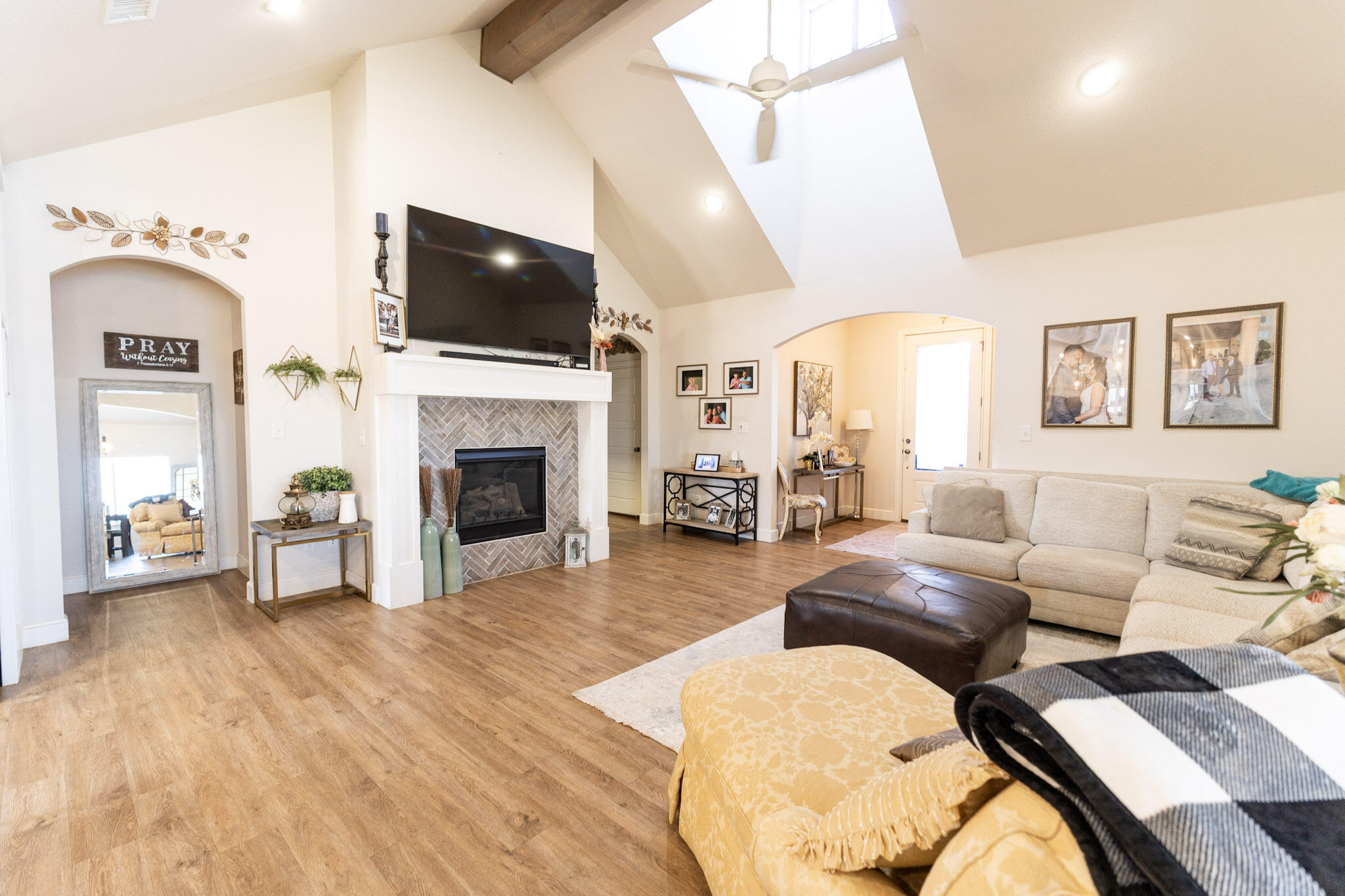 6801 51st Street Lubbock, TX 79407 - Photo 3 of 19 a living room with furniture fireplace and flat screen tv