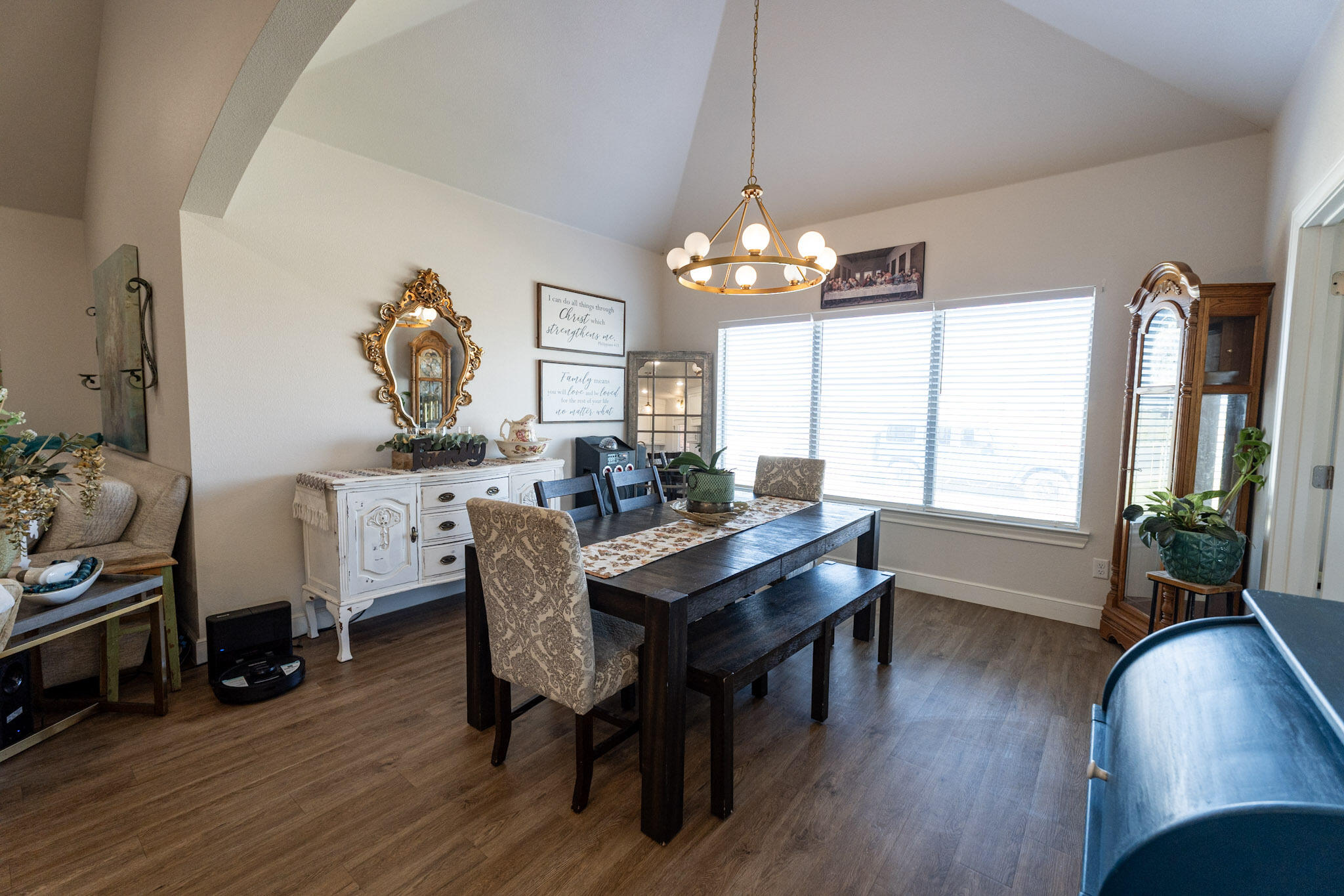 6801 51st Street Lubbock, TX 79407 - Photo 7 of 19 a view of a dining room with furniture window and wooden floor