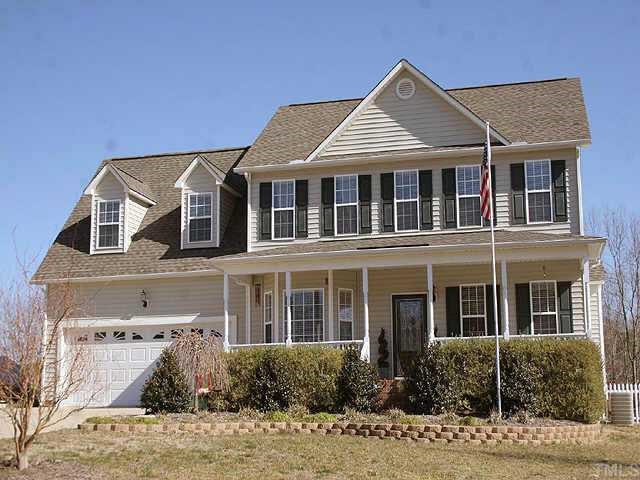 127 Saddle Ridge Drive Willow Spring, NC 27592 - Photo 1 of 10 a front view of a house