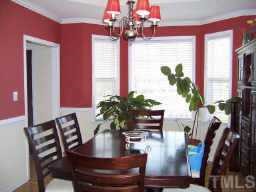 127 Saddle Ridge Drive Willow Spring, NC 27592 - Photo 6 of 10 a view of a dining room with furniture window and wooden floor