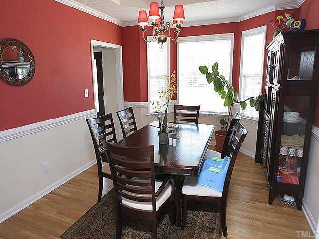 127 Saddle Ridge Drive Willow Spring, NC 27592 - Photo 10 of 10 a view of a dining room with furniture window and wooden floor