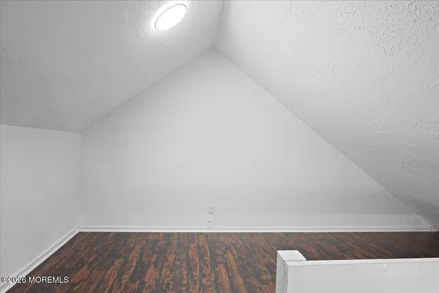 a workspace with furniture and a potted plant