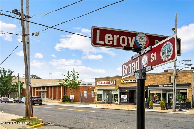 front view of house with a tree