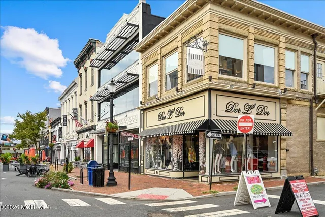 a front view of a building with street view