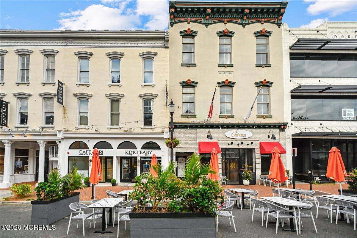 17 Leroy Place, Unit 3B Red Bank, NJ 07701 - Photo 30 of 38 a front view of multi story residential apartment building with yard