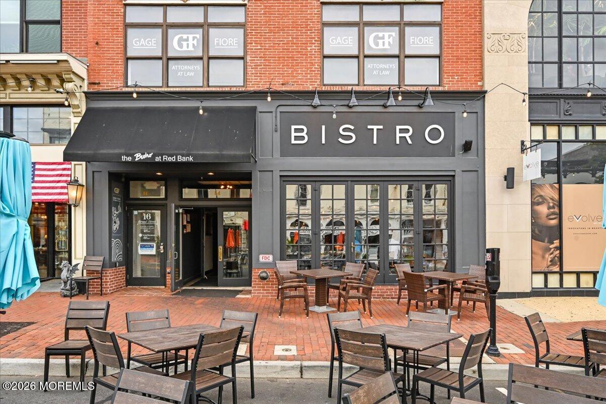 17 Leroy Place, Unit 3B Red Bank, NJ 07701 - Photo 32 of 38 a view of a cafe with a table and chairs