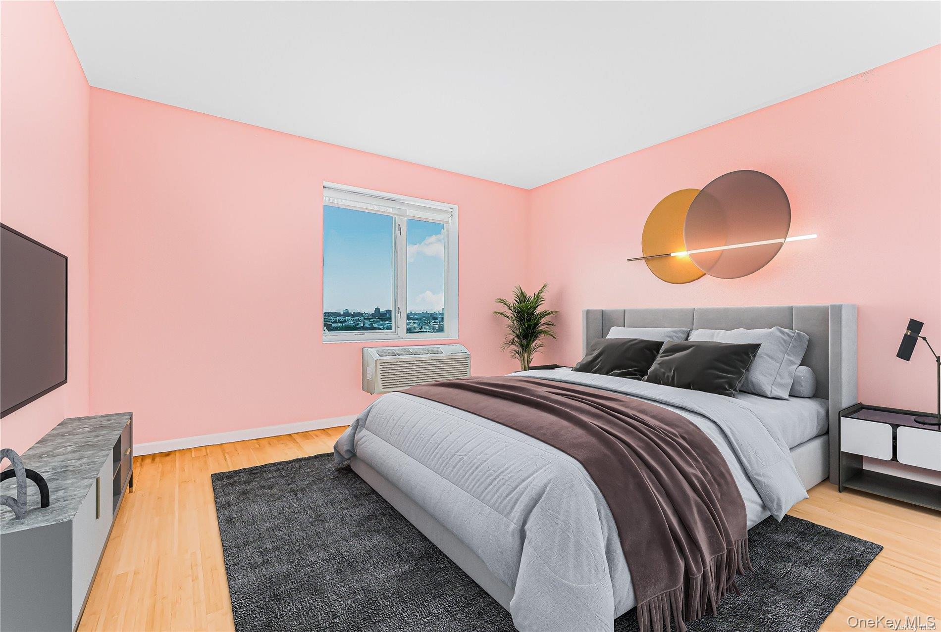 112-02 Northern Boulevard, Unit PHC Queens, NY 11368 - Photo 9 of 24 a bedroom with a bed and a flat screen tv