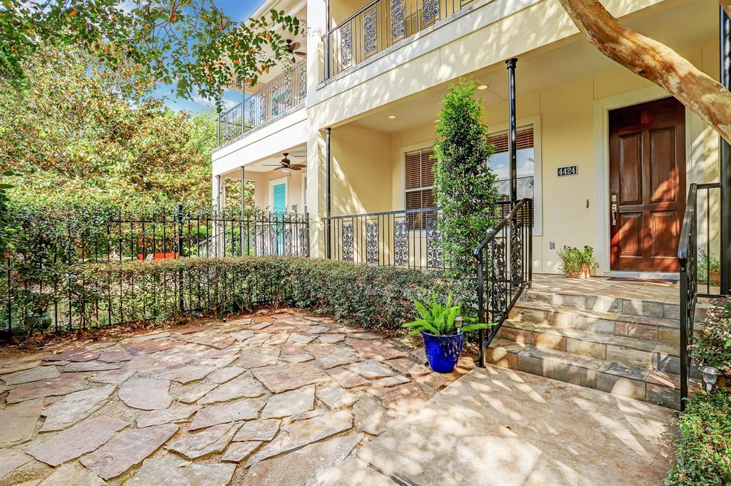 Welcome home to 4424 Blossom! Private gated patio is one of three lovely outdoor spaces.