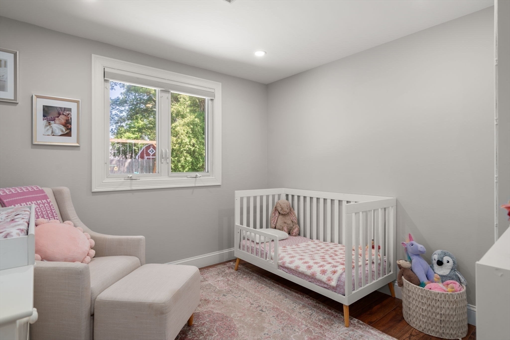 10 Brookdale Road Natick, MA 01760 - Photo 13 of 19 a bedroom with a bed and a window