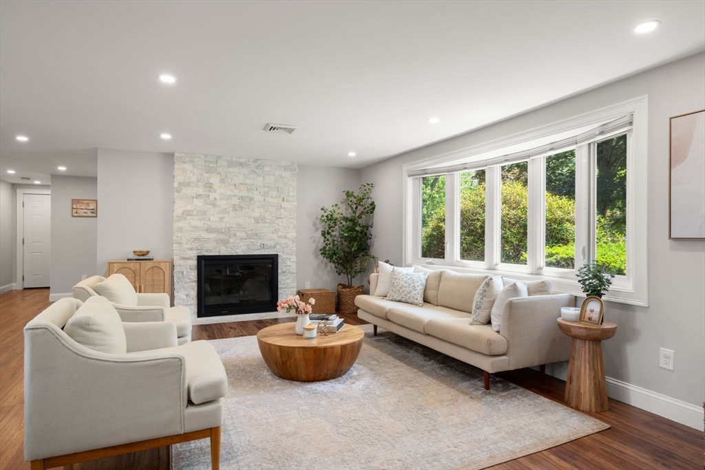 10 Brookdale Road Natick, MA 01760 - Photo 2 of 19 a living room with furniture and a fireplace