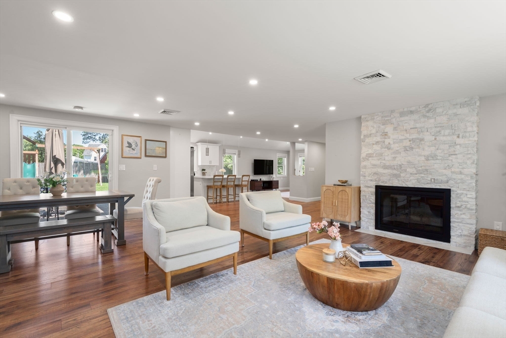 10 Brookdale Road Natick, MA 01760 - Photo 3 of 19 a living room with furniture and a fireplace