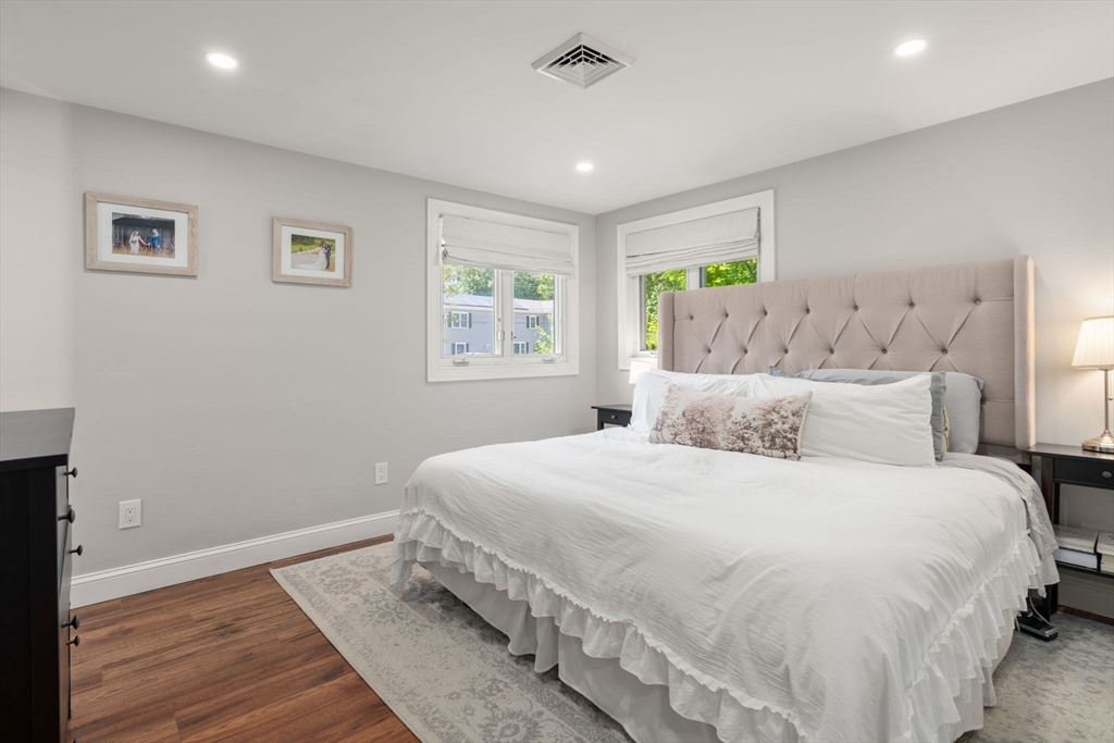 10 Brookdale Road Natick, MA 01760 - Photo 10 of 19 a bedroom with a large bed and a window