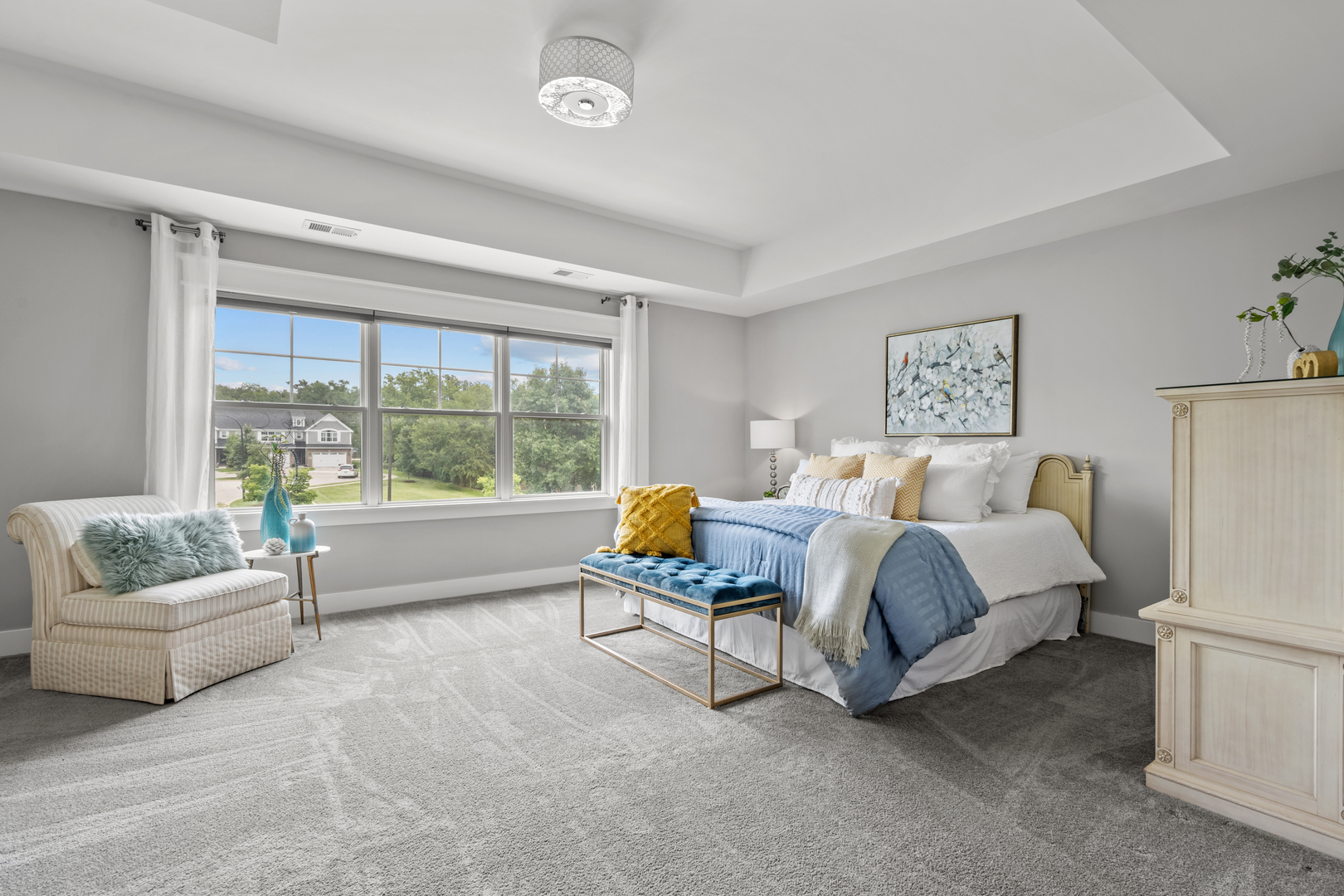 613 Bourbon Lane Naperville, IL 60565 - Photo 12 of 36 a bedroom with a bed and a couch