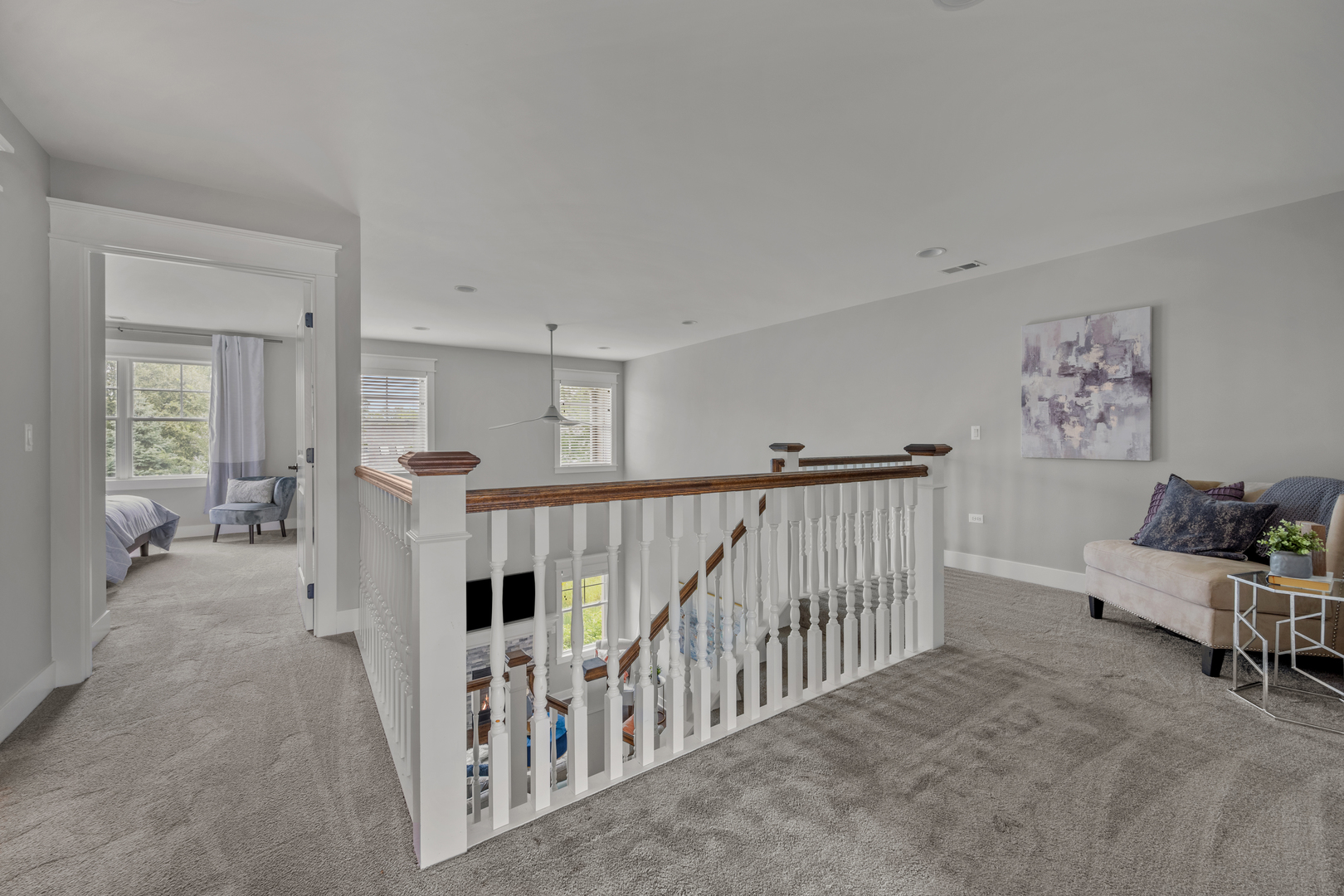 613 Bourbon Lane Naperville, IL 60565 - Photo 18 of 36 a living room with furniture and a flat screen tv