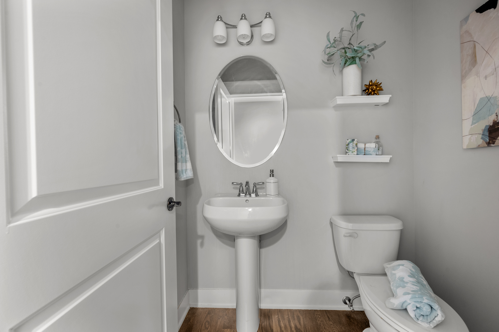 613 Bourbon Lane Naperville, IL 60565 - Photo 19 of 36 a bathroom with a toilet sink and mirror